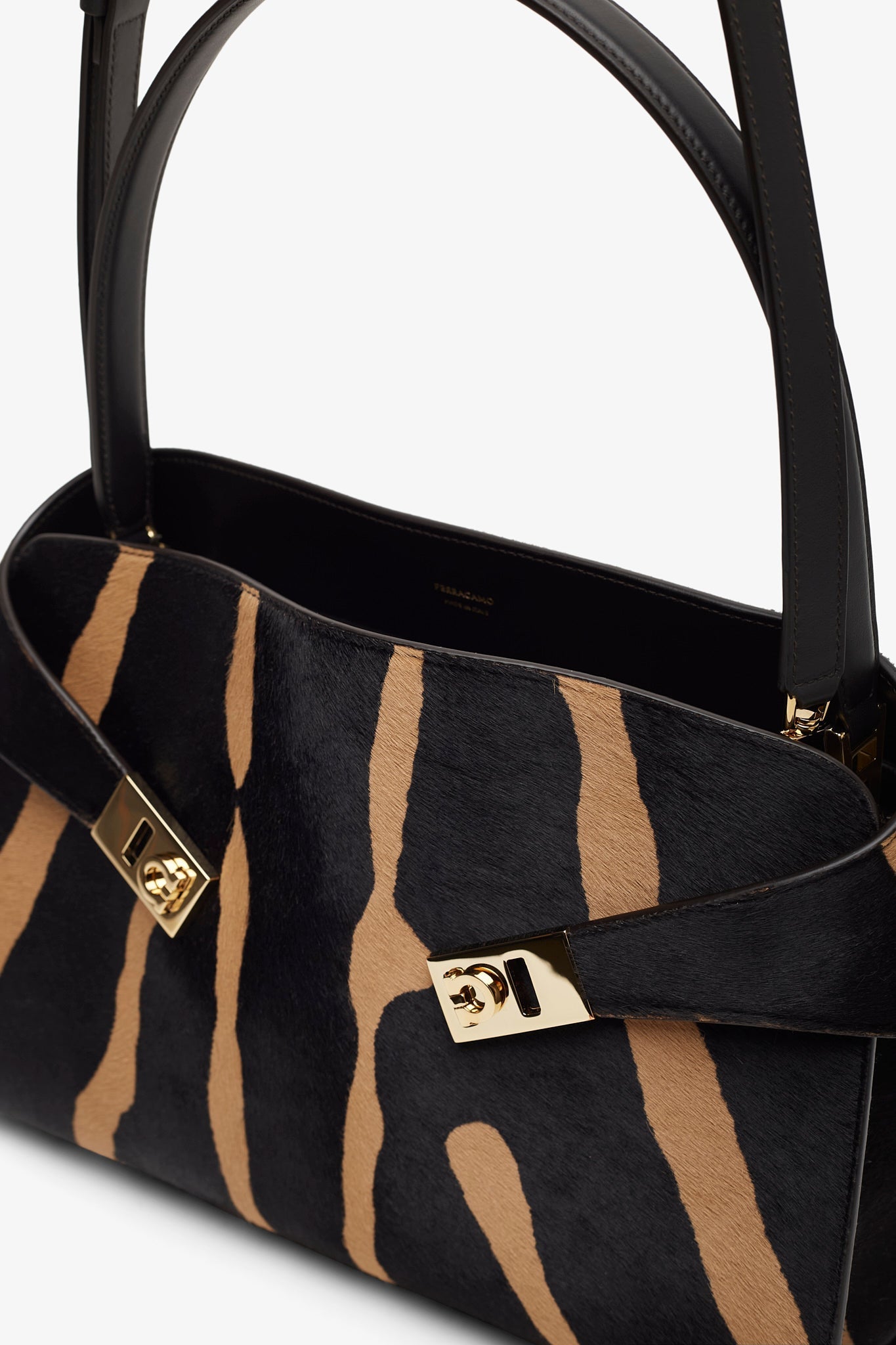 Hug small black and brown shoulder bag