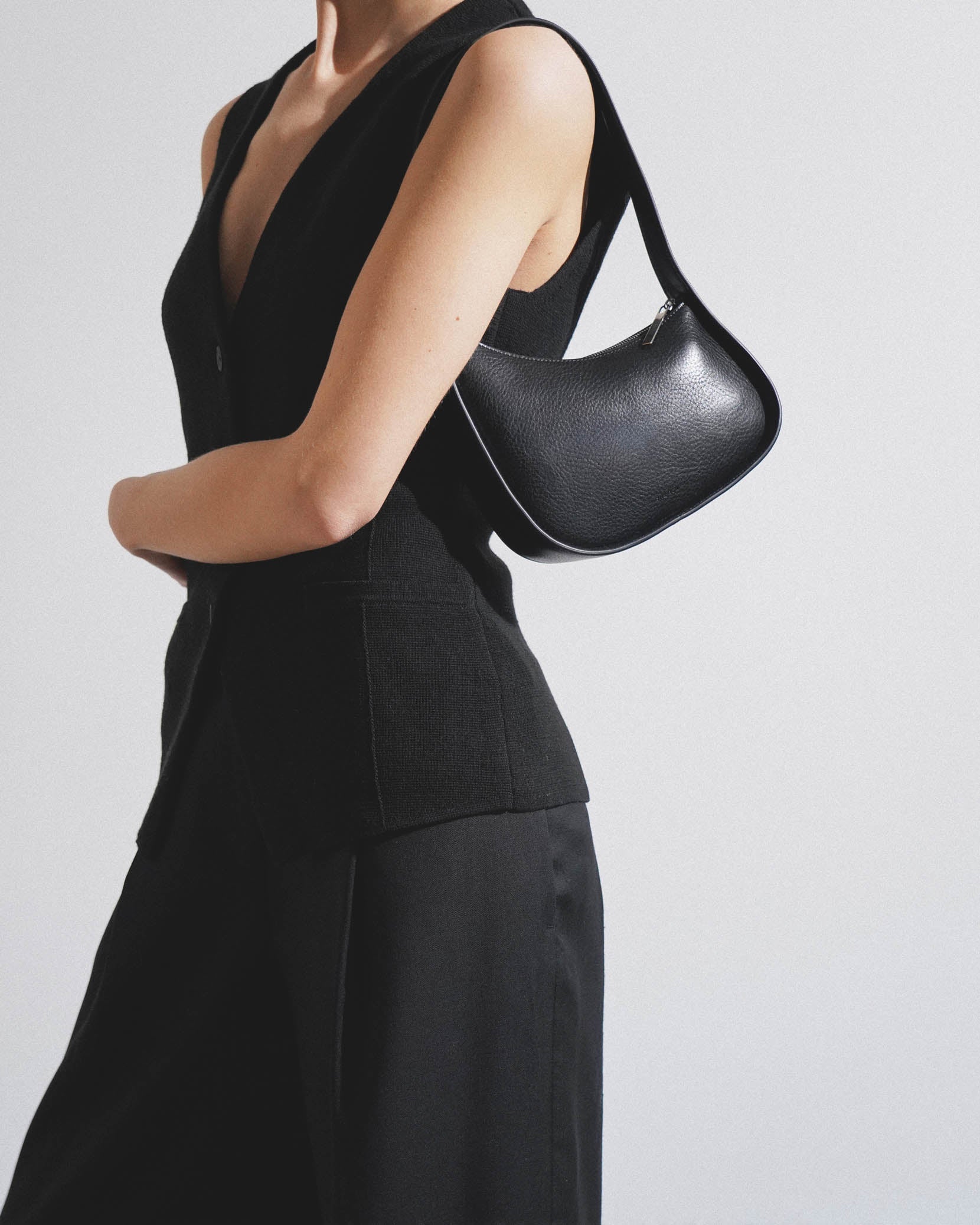 Half moon black leather bag