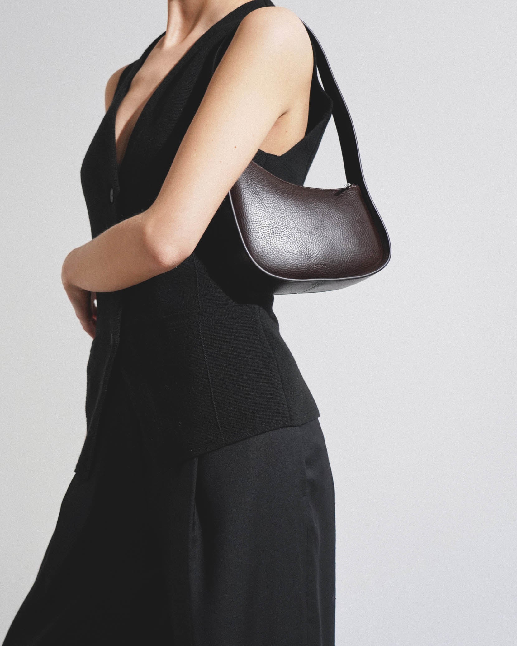 Half moon brown leather bag