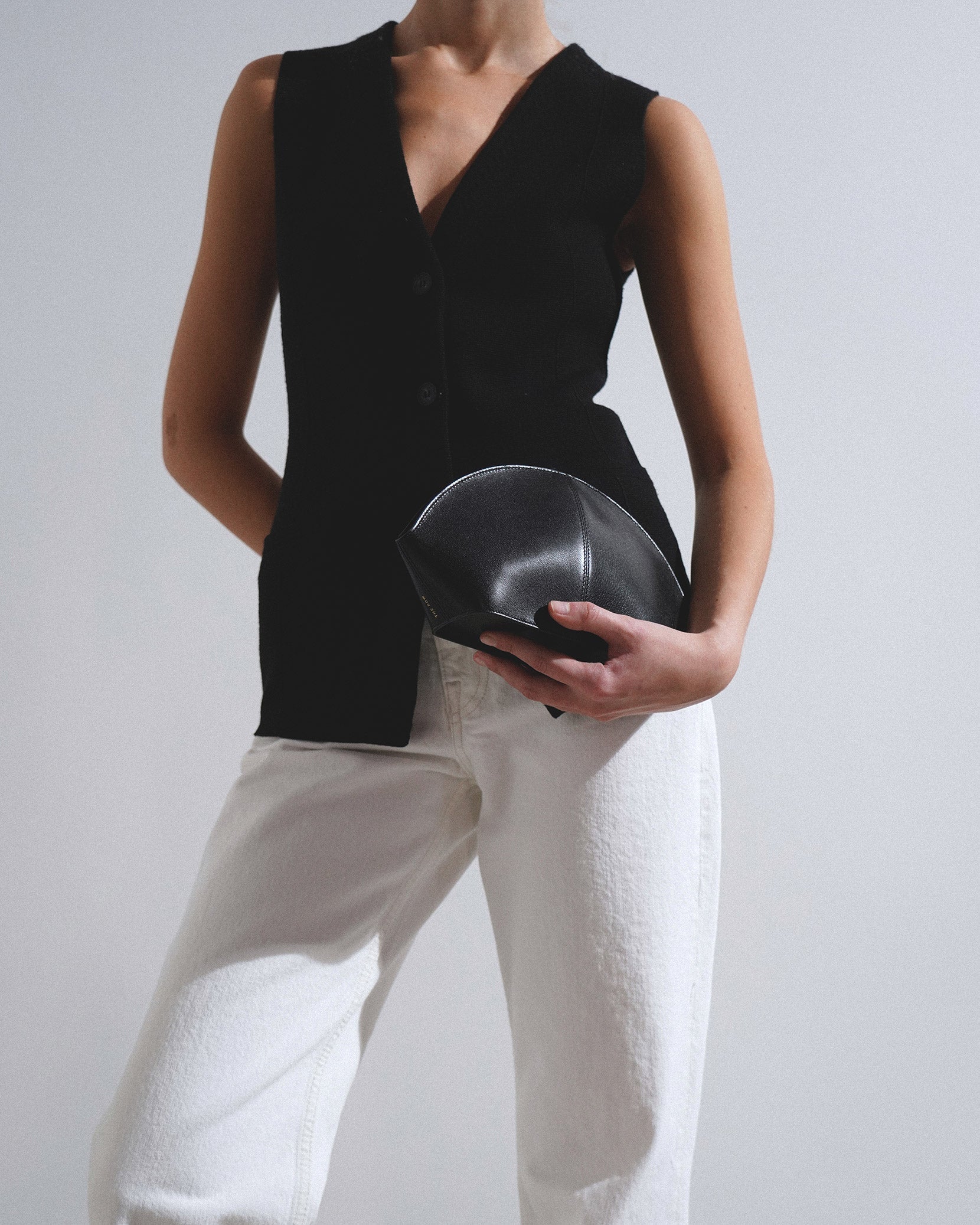 Mel black leather clutch