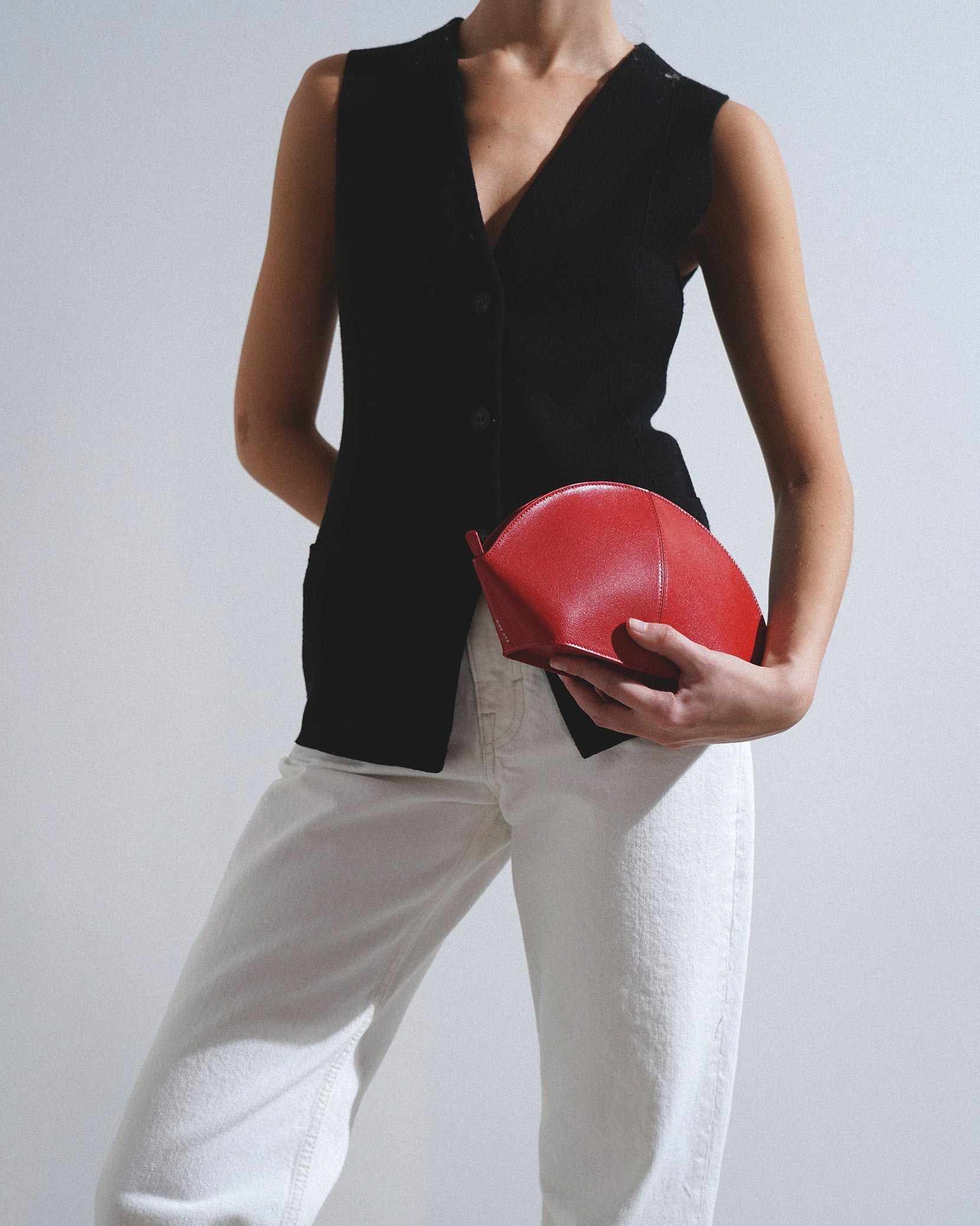 Mel red leather clutch