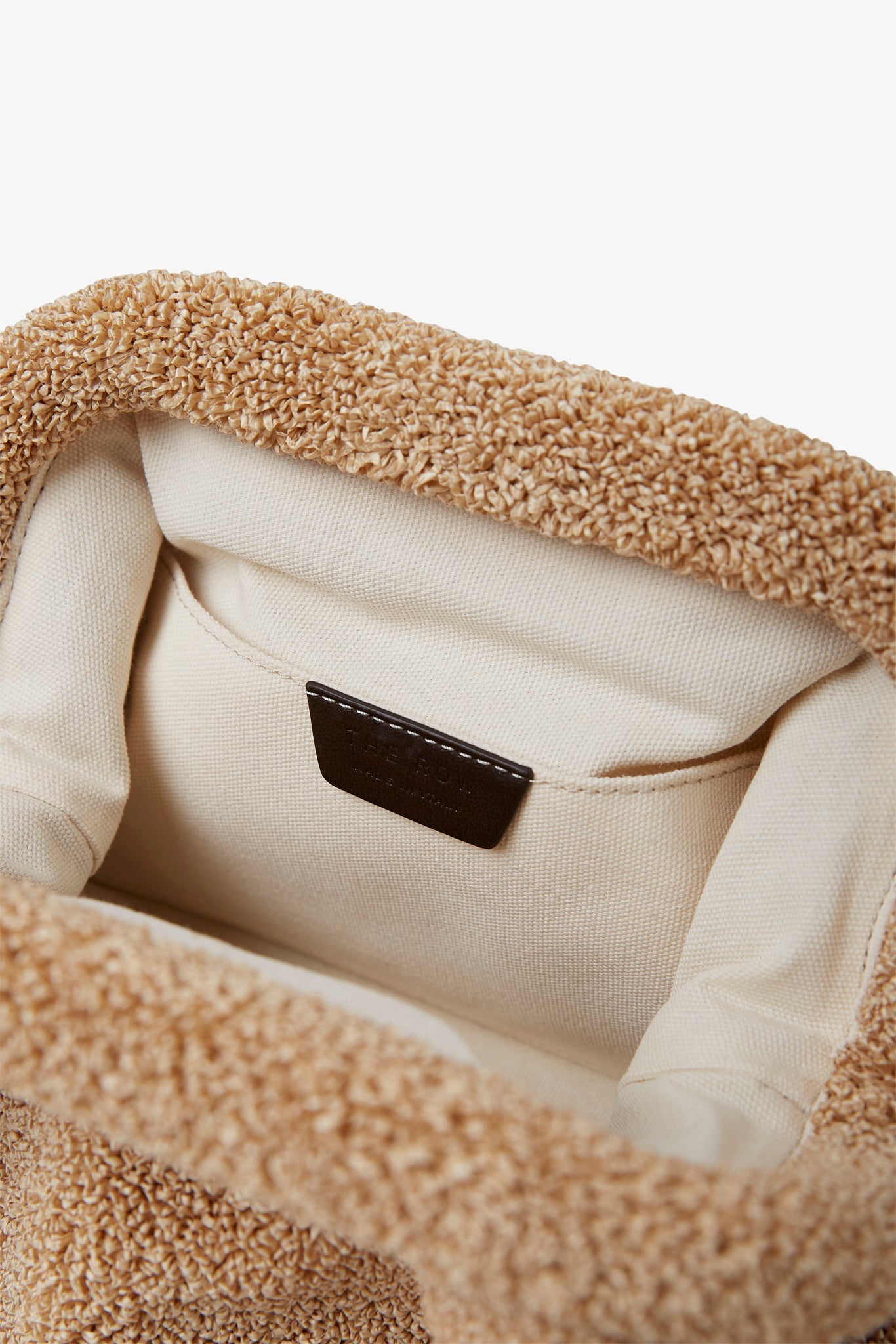 Mira natural raffia clutch