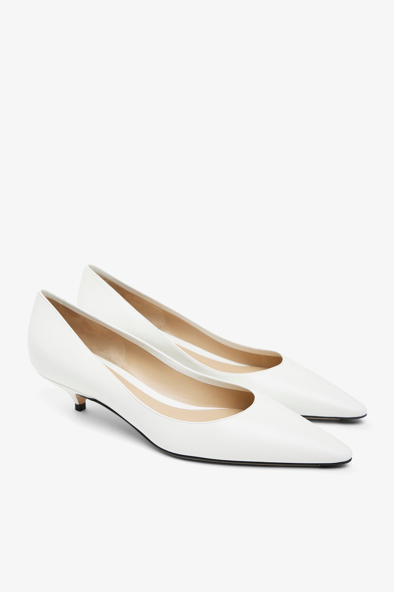 Liisa Kitten Two white pumps