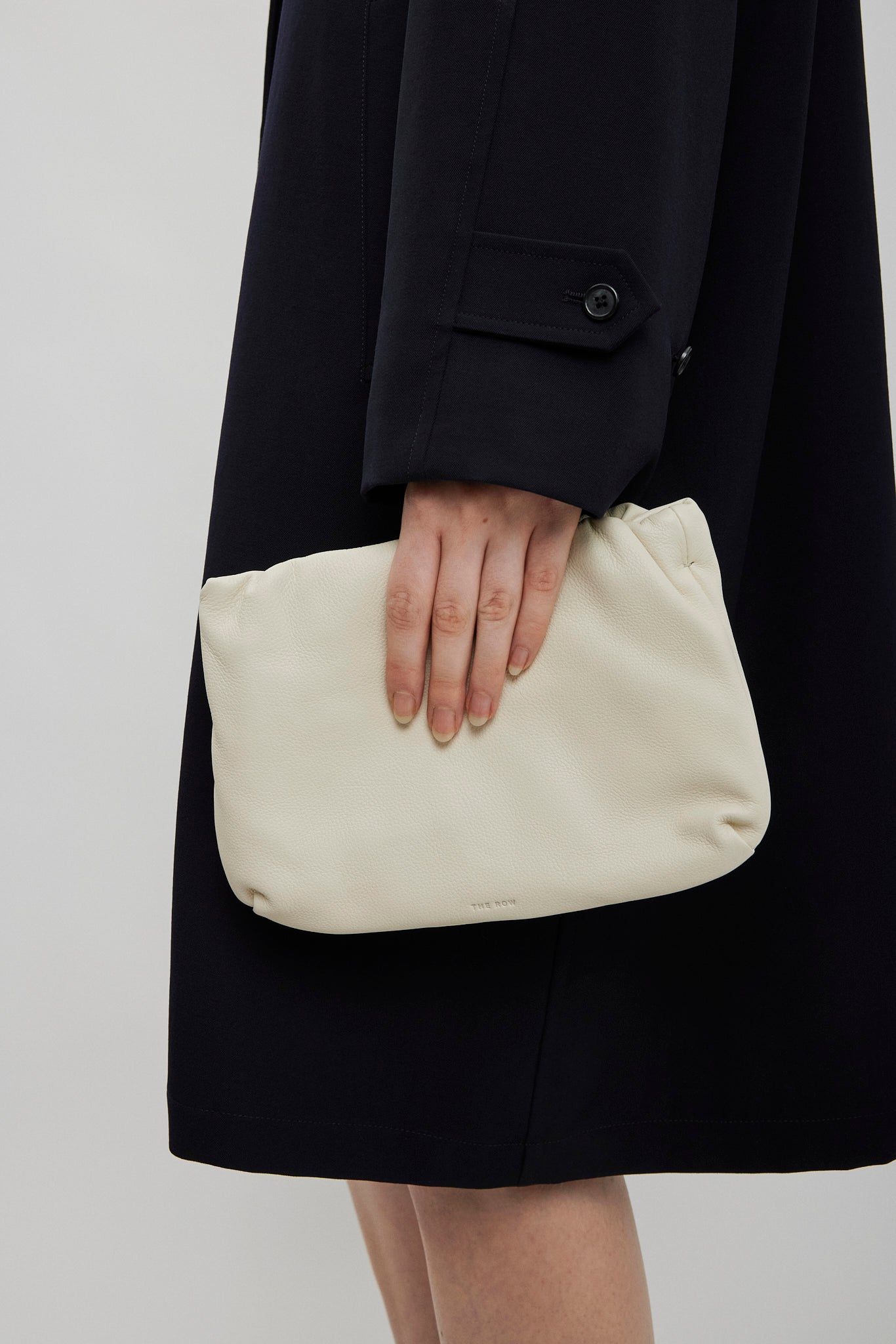 Bourse Ivory leather clutch bag