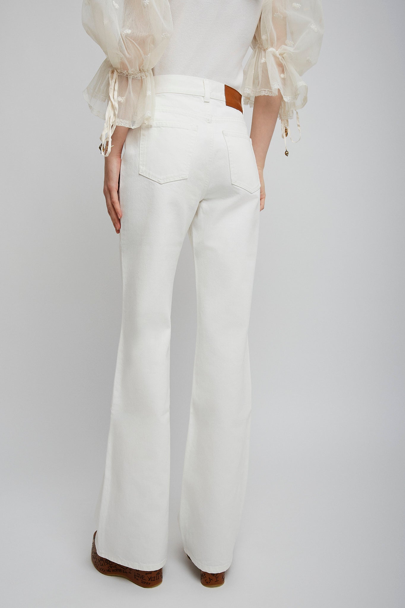 High-rise white denim flare jeans
