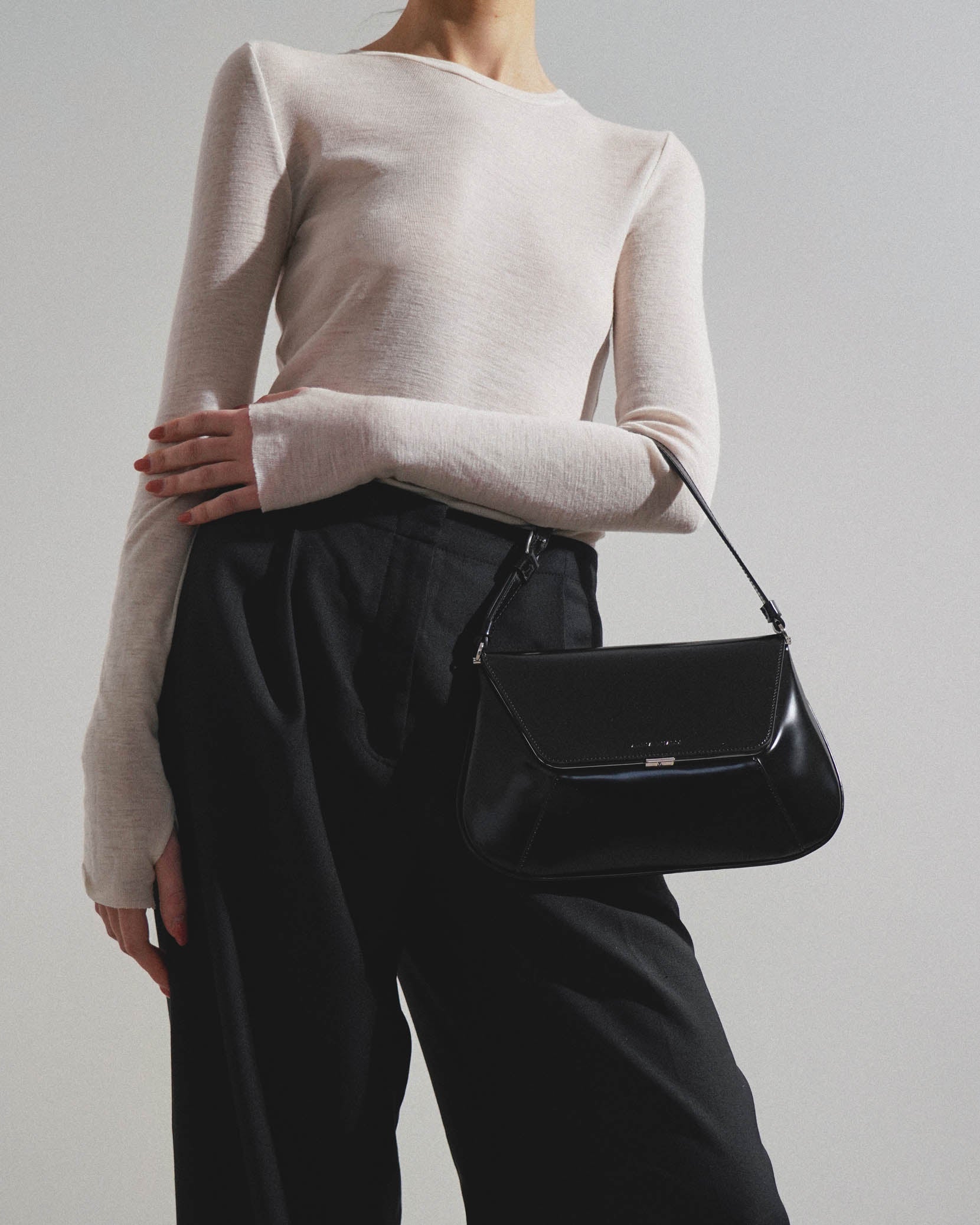 Ami Spazzolato black leather bag