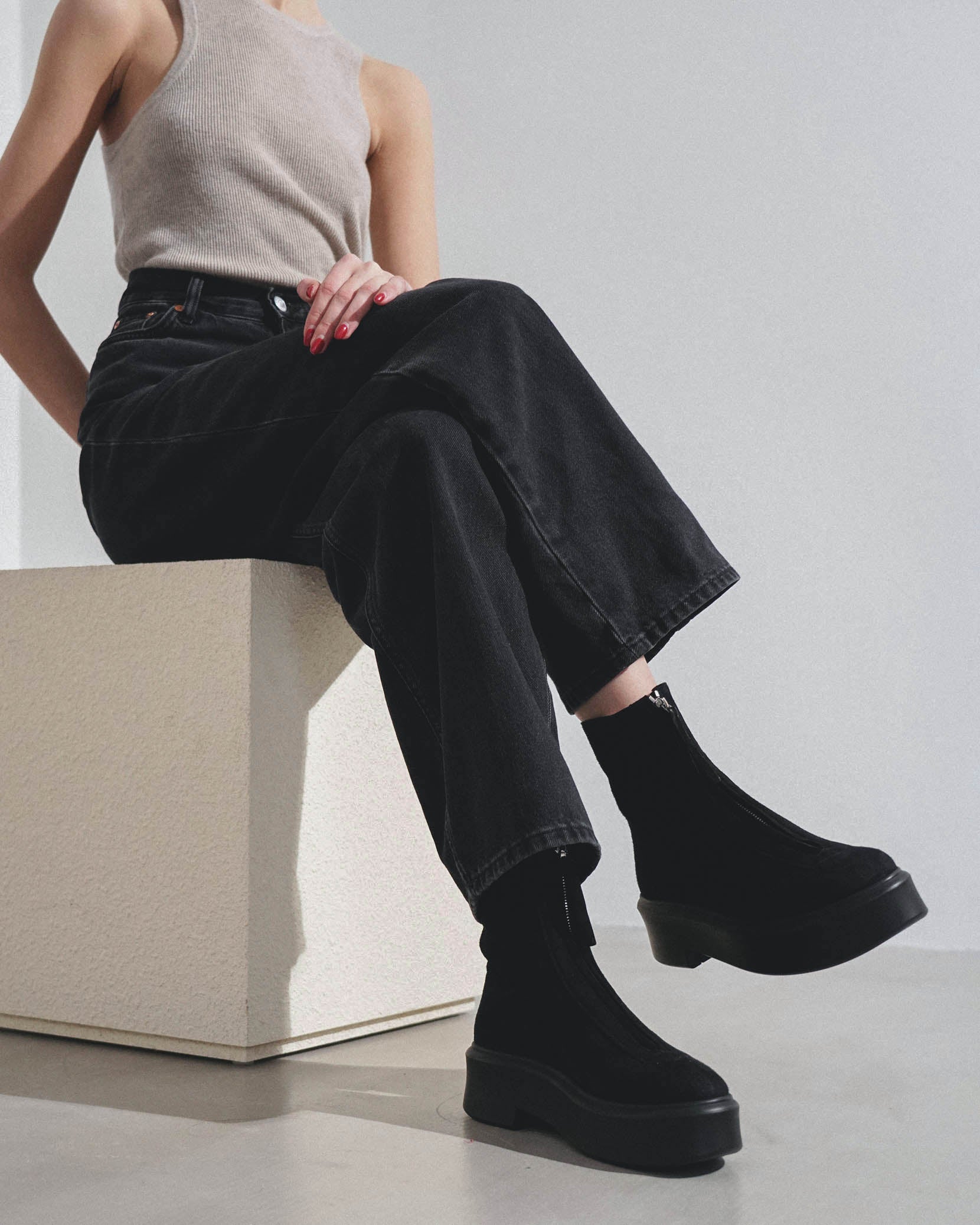 Zipped I black suede ankle boots