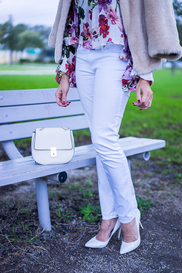 Amanda wearing white AG jeans paired with a Forever 21 crossbody bag
