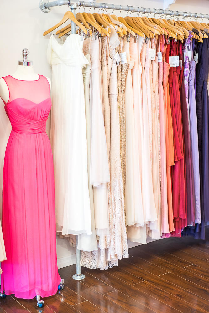 a rack of clothes for women