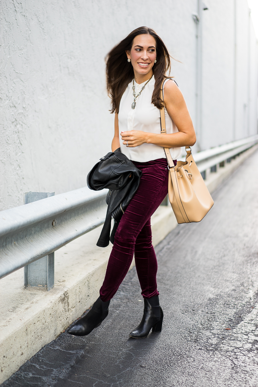 Best Luxury Designers Handbags Blogger Top Quality Luxury Handbag Shop shares a photo of her wearing white top and maroon bottoms