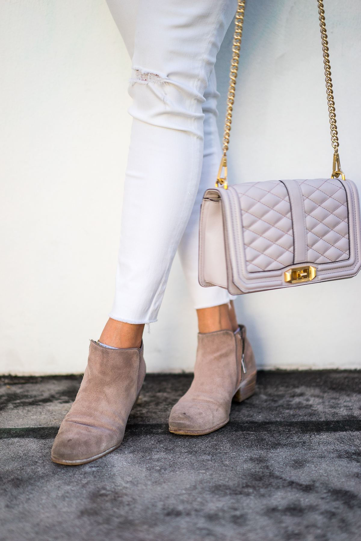 Best Luxury Designers Handbags blogger wears Sam Edelman petty boots with Rebecca Minkoff love crossbody bag