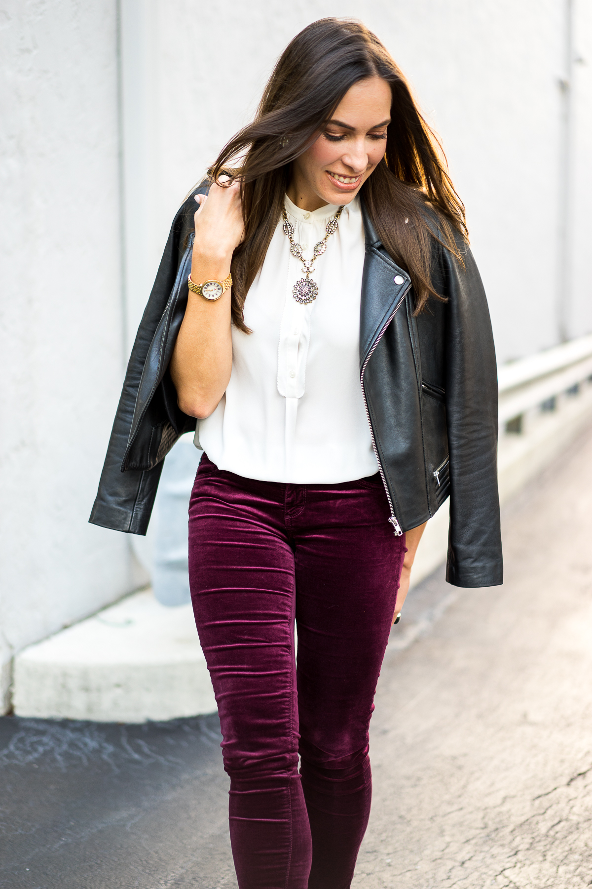 Best Luxury Designers Handbags Blogger Top Quality Luxury Handbag Shop shares How to Wear Velvet Leggings for Fall - in photo: Amanda wearing white top, moto jacket, and  AG super skinny velvet leggings