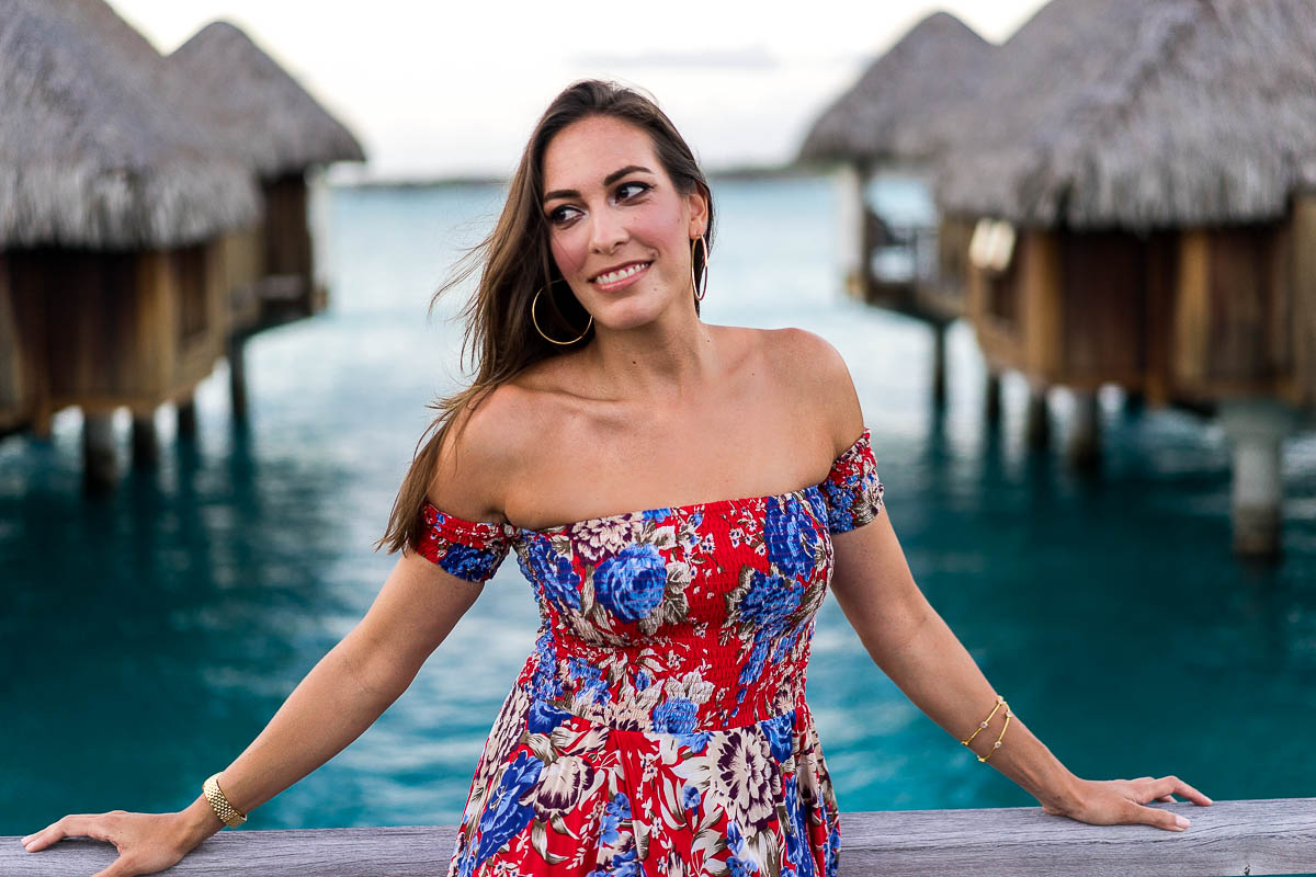 Blogger Best Luxury Designers Handbags enjoys sunset in Bora Bora wearing floral maxi dress by Auguste the Label by overwater bungalows