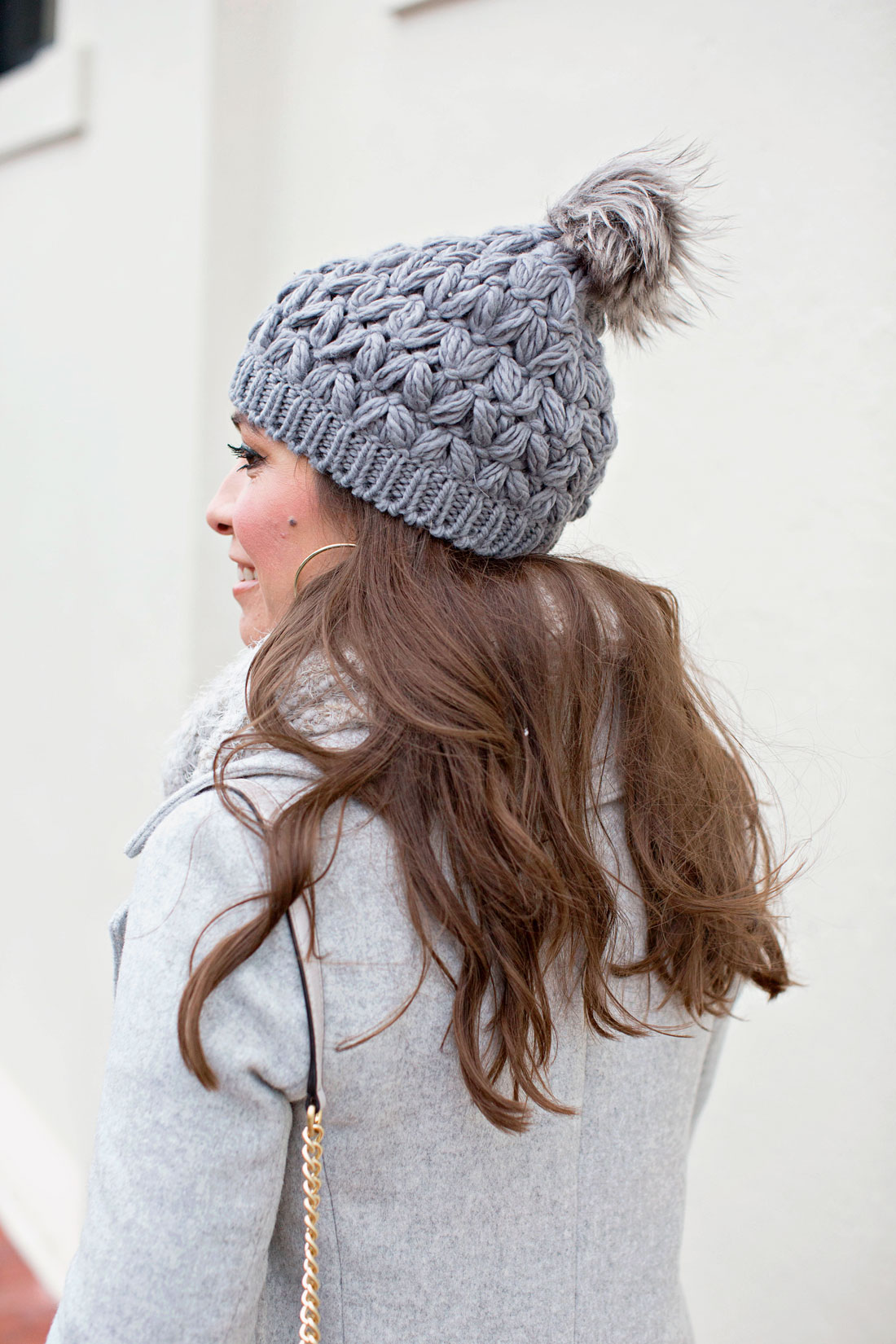 Amanda from Best Luxury Designers Handbags blog wears BP grey beanie from Nordstrom with her travel outfits