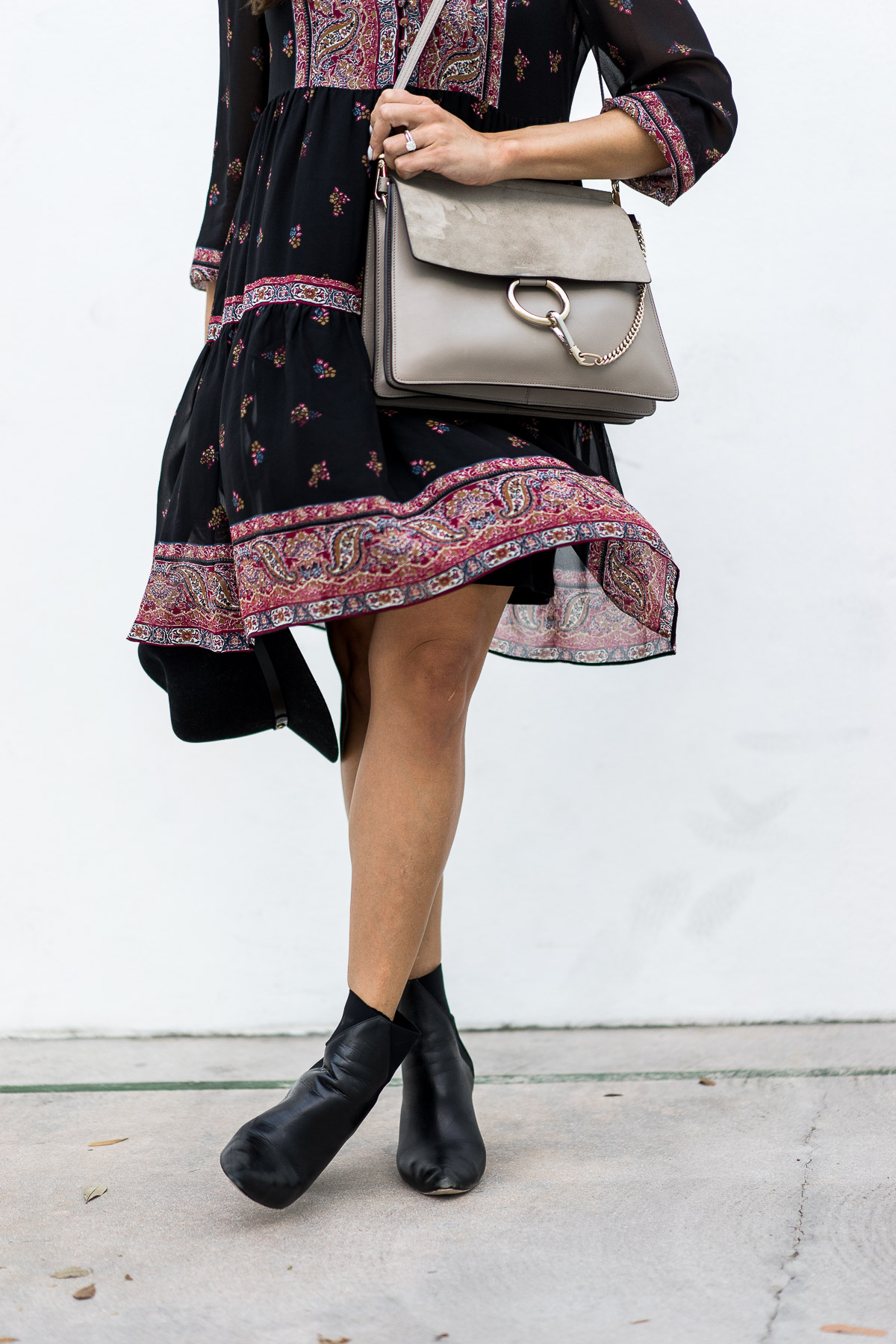 Best Luxury Designers Handbags blogger shares her boho style carrying Chloe Faye bag and completing the look in ASKA Troy booties