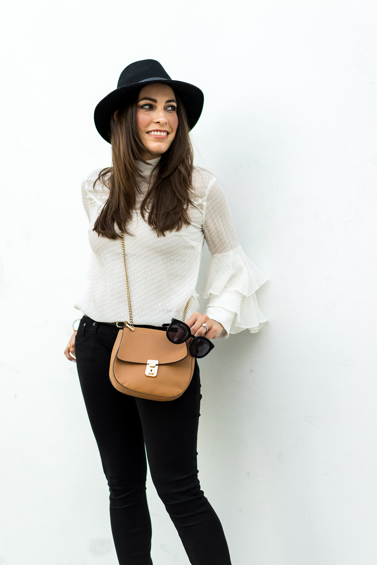 A clean sheer white blouse is easy fashion by Amanda of Best Luxury Designers Handbags blog