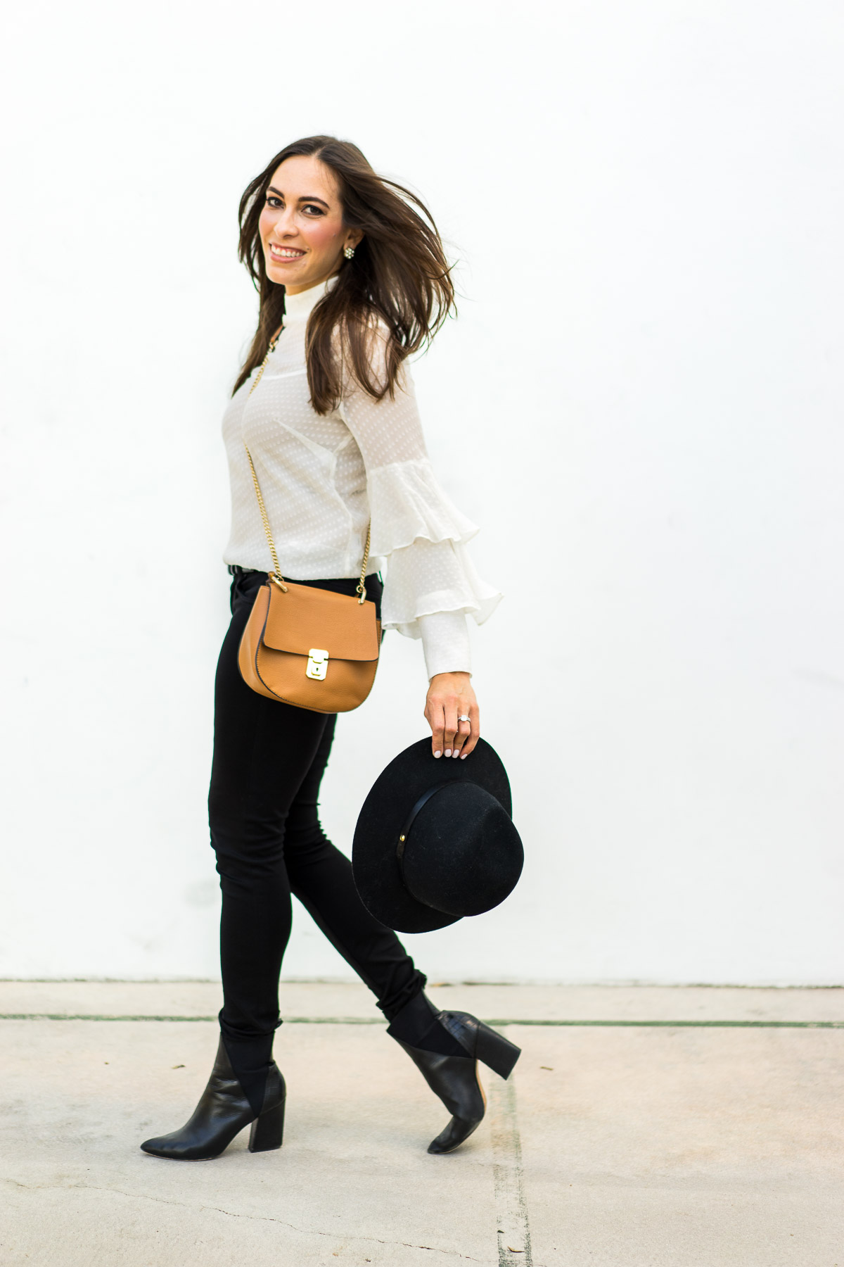 Best Luxury Designers Handbags South Florida blogger wears sheer white blouse with black AG Jeans leggins and Chloe Drew dupe bag