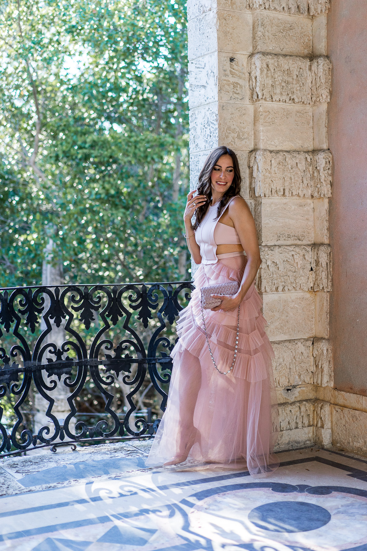 Blogger Amanda from Best Luxury Designers Handbags enjoys Viscaya Gardens in Miami in a dreamy BCBG blush tulle dress