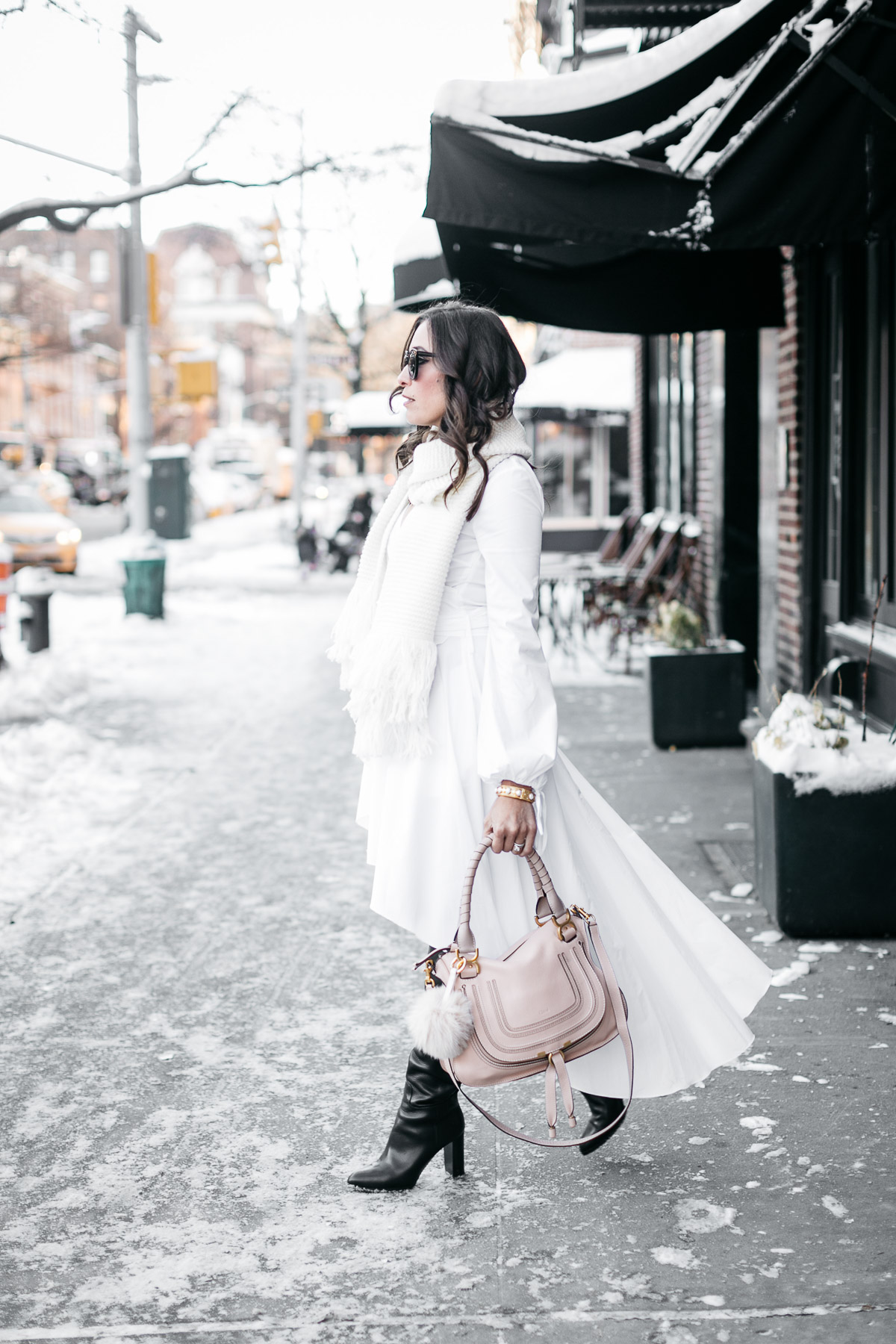 NYFW street style by Amanda of Best Luxury Designers Handbags wearing Carolina Constas white shirt dress and Chloe Marcie bag with MGemi Pendolo boots