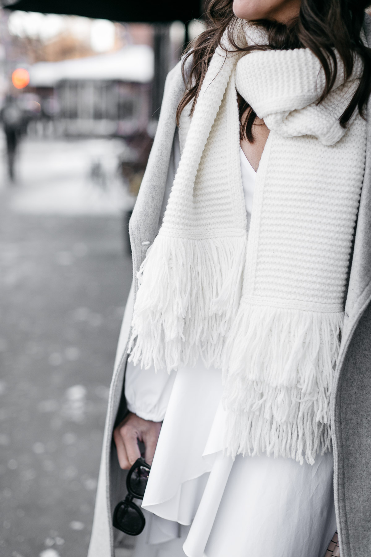 Club Monaco Juki white fringed scarf is styled by Amanda of Best Luxury Designers Handbags blog during NYFW Spring 2017