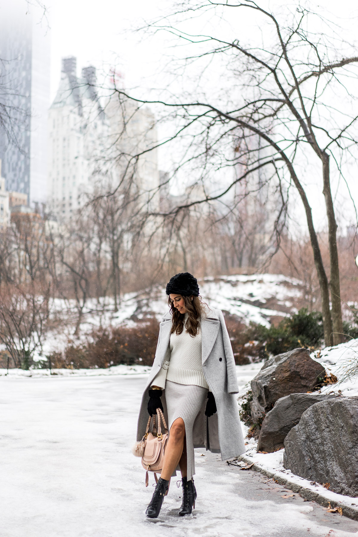 BCBGeneration skirt paired with Club Monaco Daylina coat and white knit sweater with blush nude Chloe Marcie bag by Best Luxury Designers Handbags blogger Amanda during NYFW in Central Park