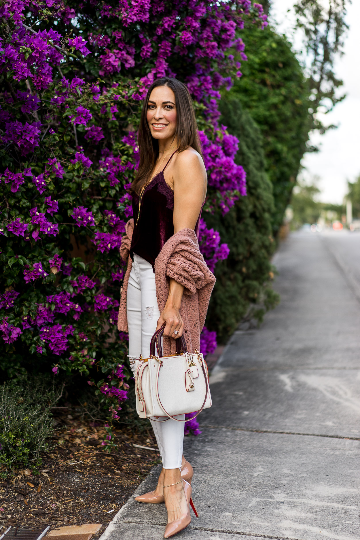 fashion blogger Amanda of A Glam LIfestyle wearing blush Free People cardigan and velvet cami top