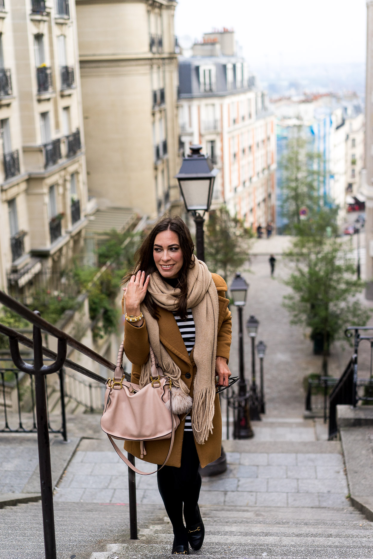 Things to do in Montmartre include walking up the stairs at Rue Foyatier near the Sacre Couer church shown by AGlamLifestyle blogger Amanda