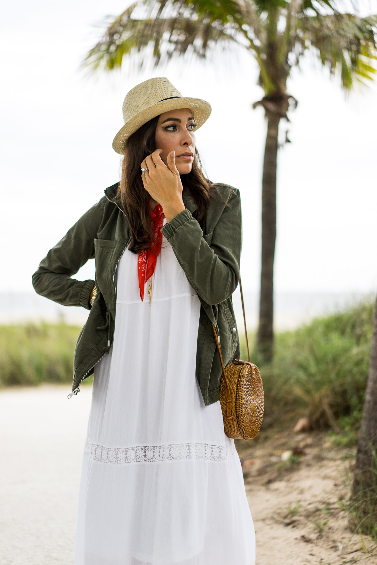 Summer fashion staples include olive utility jacket and white maxi dress by Old Navy and round basket bag