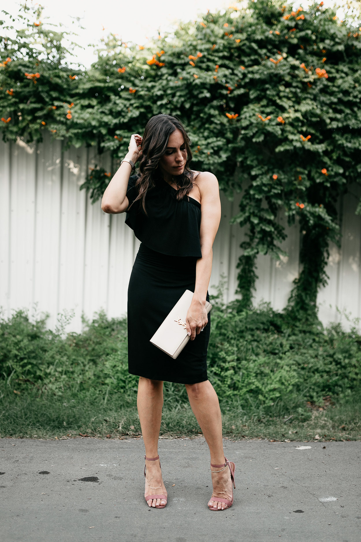 Wear a simple Three Dots black ruffle dress for your next date night as styled by Best Luxury Designers Handbags blogger Amanda with chic details like mauve heels and nude YSL clutch