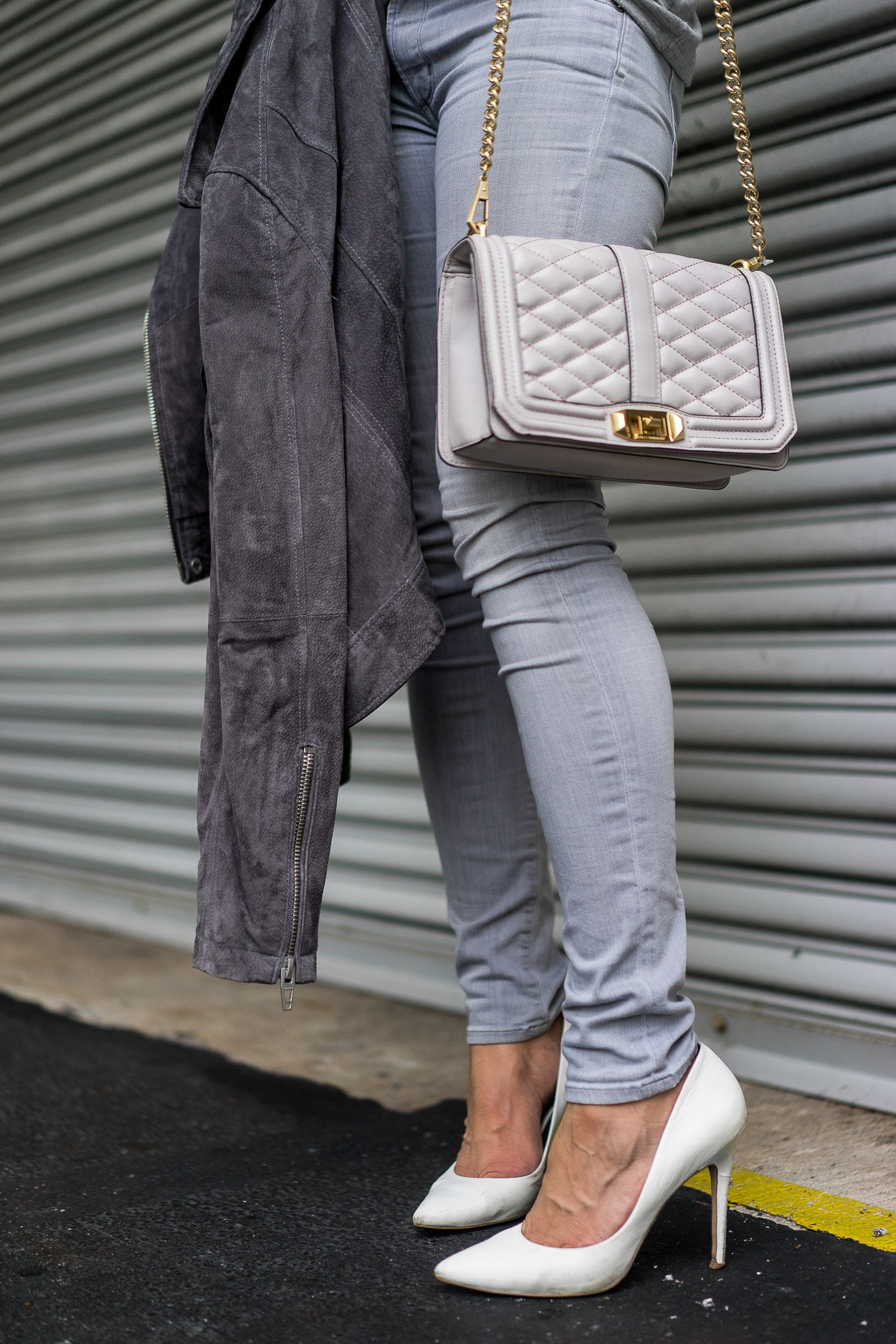 Blogger Amanda of Best Luxury Designers Handbags wears Rebecca Minkoff Love Crossbody bag and Blank NYC grey suede jacket for easy Fall style
