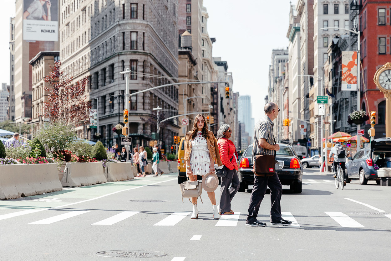 White booties and Chicwish dress stop traffic in the Flatiron district of NYC by blogger Amanda of Best Luxury Designers Handbags