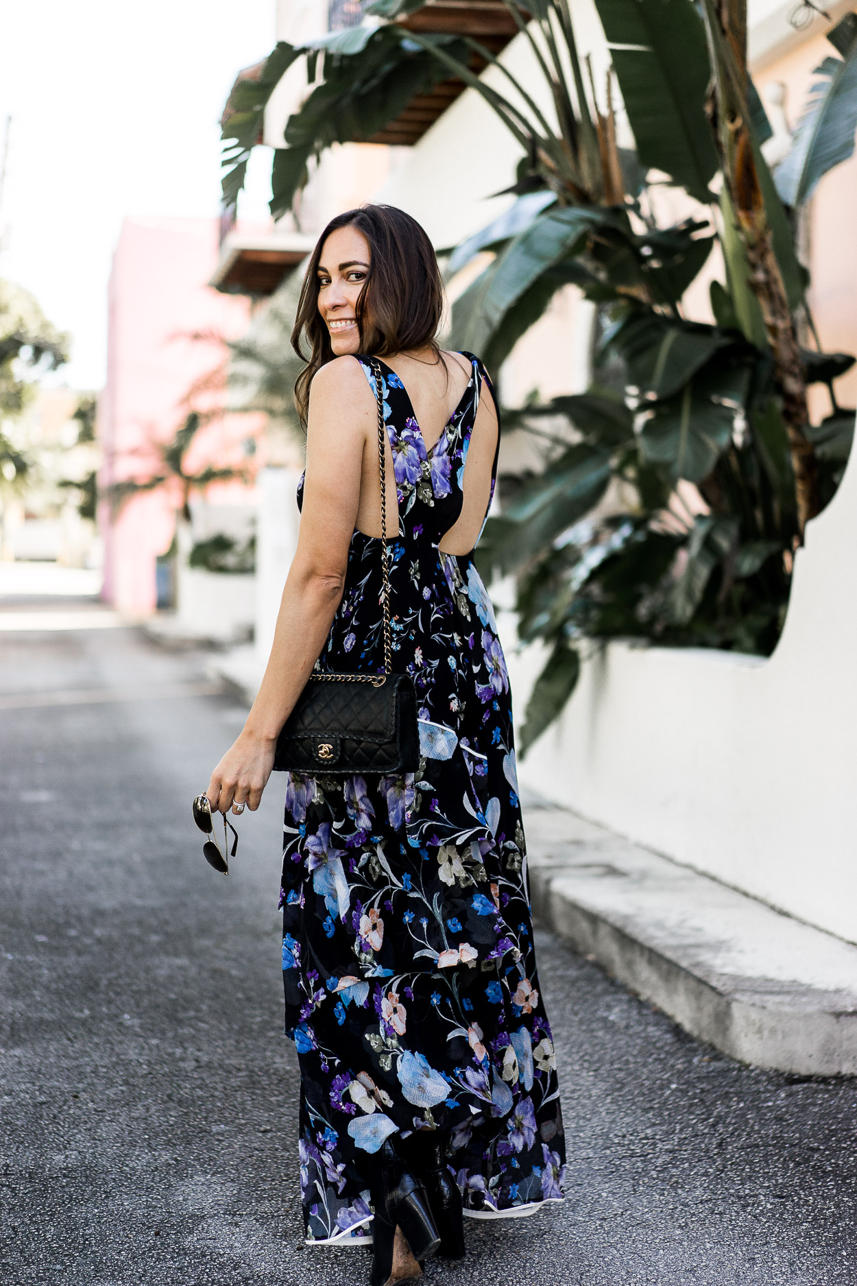 fashion blogger Amanda of Best Luxury Designers Handbags wearing floral dress