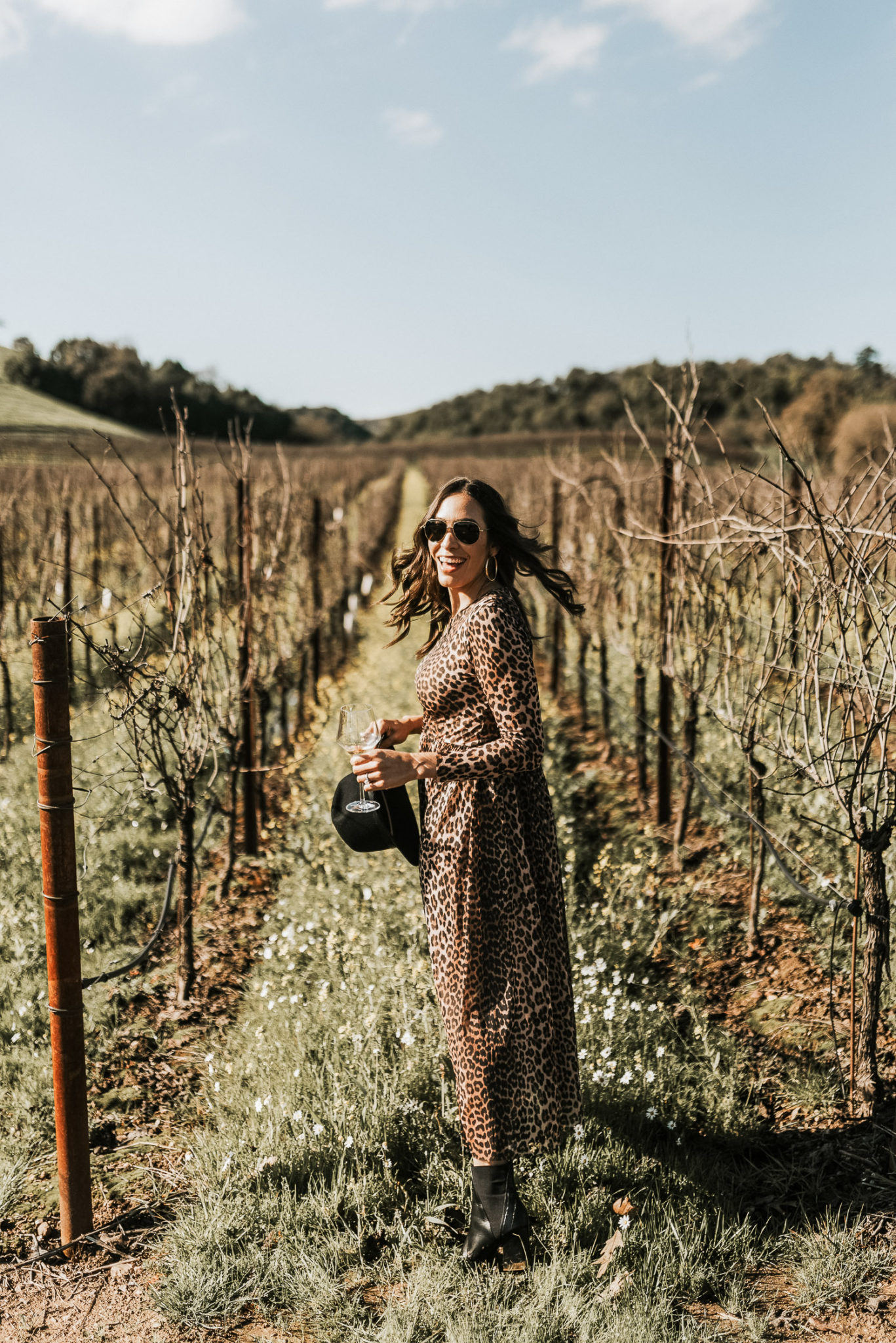 Amanda of Best Luxury Designers Handbags blog wears the Ganni leopard dress at MacRostie Winery in Sonoma