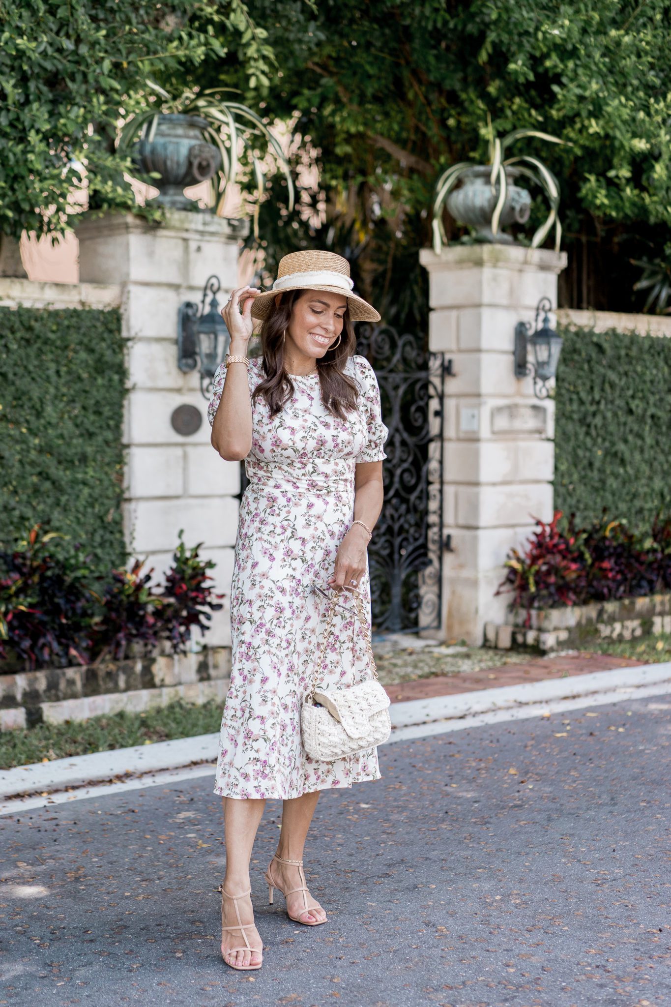 8 Affordable Fall Floral Dresses from Shopbop featured by top FL fashion blogger, Best Luxury Designers Handbags: image of a woman wearing a Renamed Apparel floral dress.